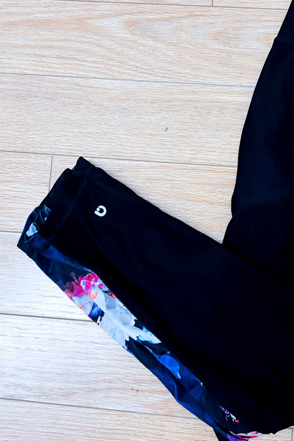Legging noir fleuri seconde main - Reitmans- La Penderie du Paradis