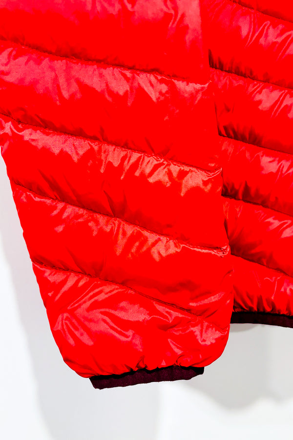 Manteau puffer orange en duvet (l) -- La Penderie du Paradis ?