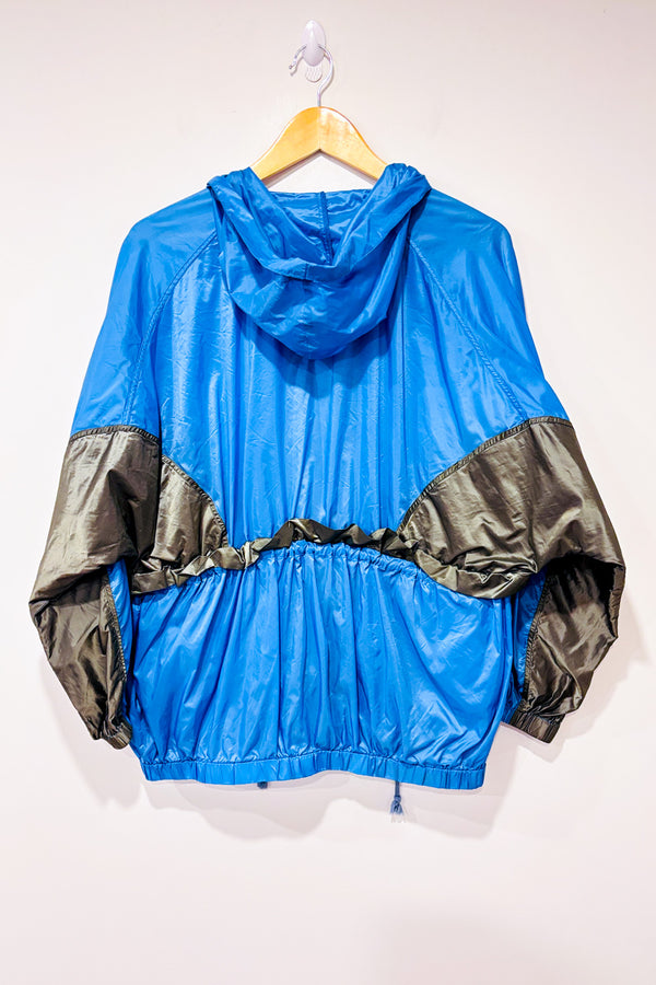 Manteau coupe-vent bleu et brun style vintage seconde main - Out From Under- La Penderie du Paradis