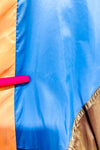 Manteau coupe-vent bleu et brun style vintage seconde main - Out From Under- La Penderie du Paradis