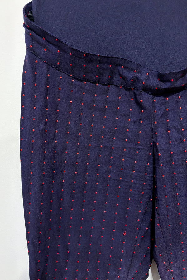 Pantalon marine avec losanges rouges (xs) - Maternité seconde main Stork & Babe