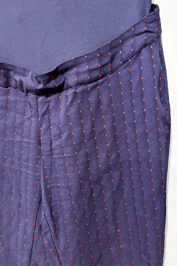 Pantalon marine avec losanges rouges (xs) - Maternité seconde main Stork & Babe