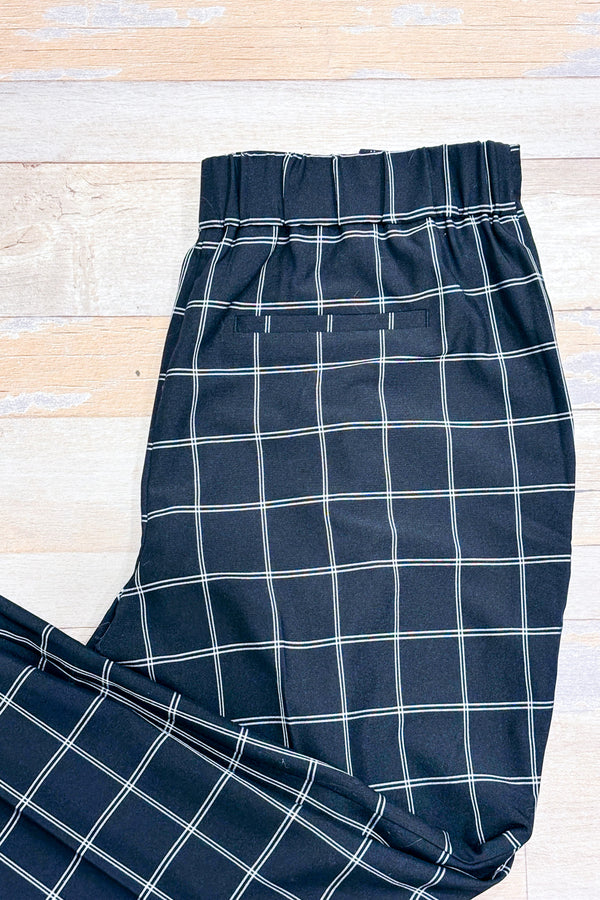 Pantalon noir et blanc à carreaux taille élastique* seconde main - Reitmans- La Penderie du Paradis