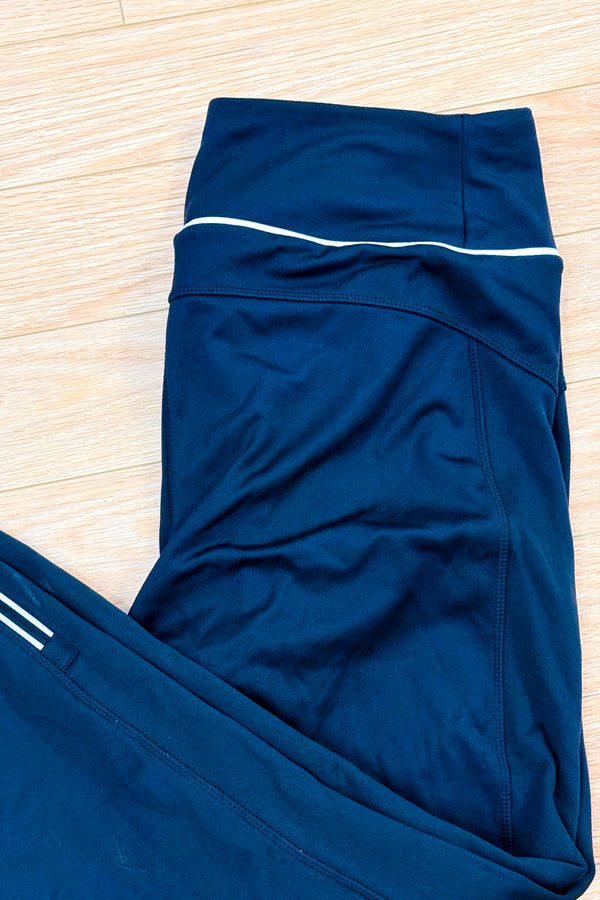 Pantalon noir à jambe étroite doublé en polar seconde main - Lolë- La Penderie du Paradis