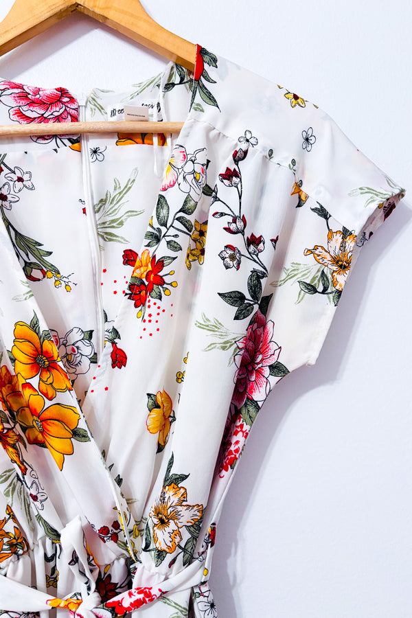 Jumpsuit blanc fleuri cache-coeur seconde main - SWS Streetwear Society- La Penderie du Paradis