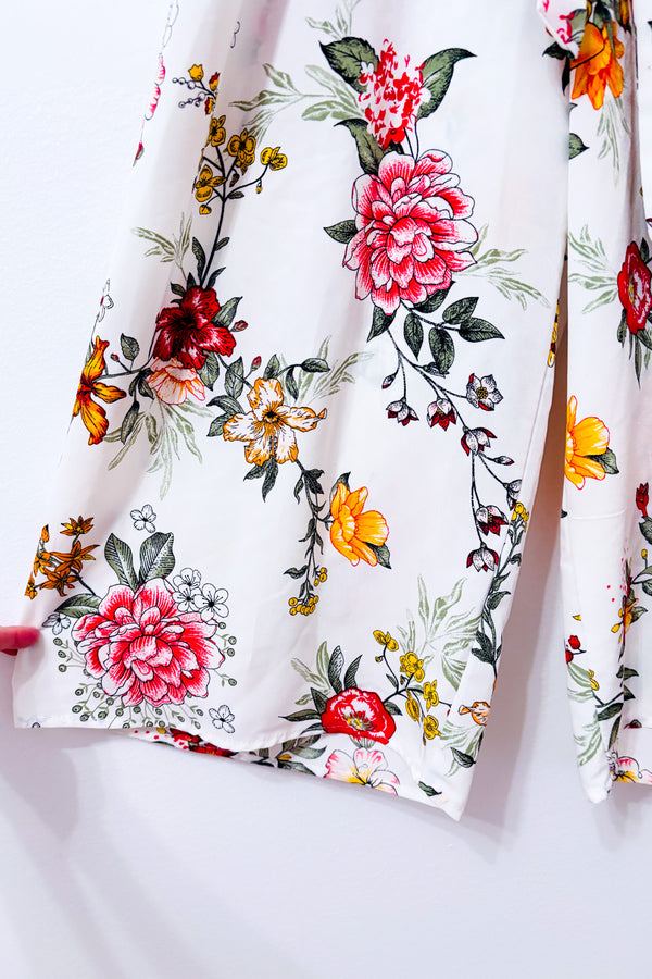 Jumpsuit blanc fleuri cache-coeur seconde main - SWS Streetwear Society- La Penderie du Paradis