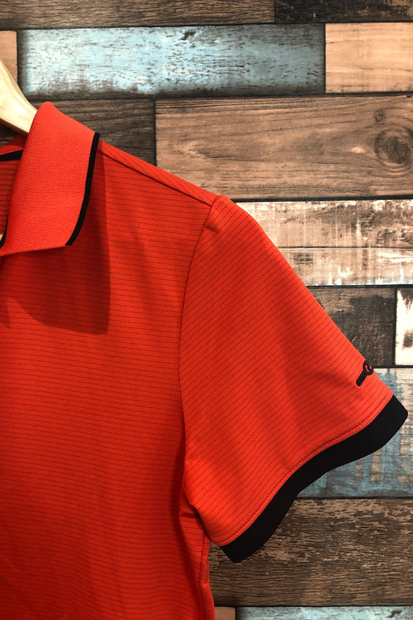 Polo de sport rouge rayé (l) seconde main Stormtech