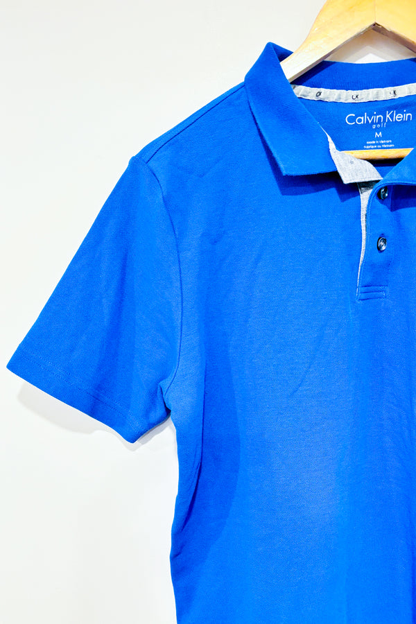 Polo indigo (m) - Homme -- La Penderie du Paradis ?