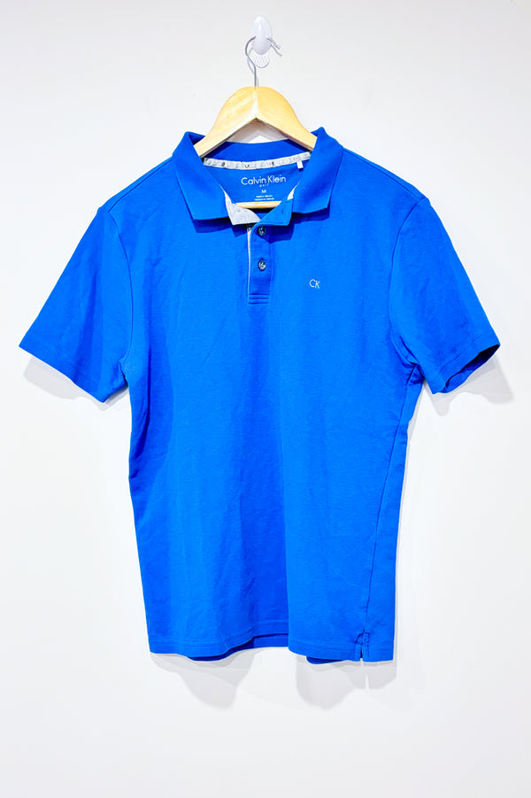 Polo indigo (m) - Homme -- La Penderie du Paradis ?