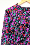 Robe midi noire et rose fleurie (l) seconde main Calvin Klein