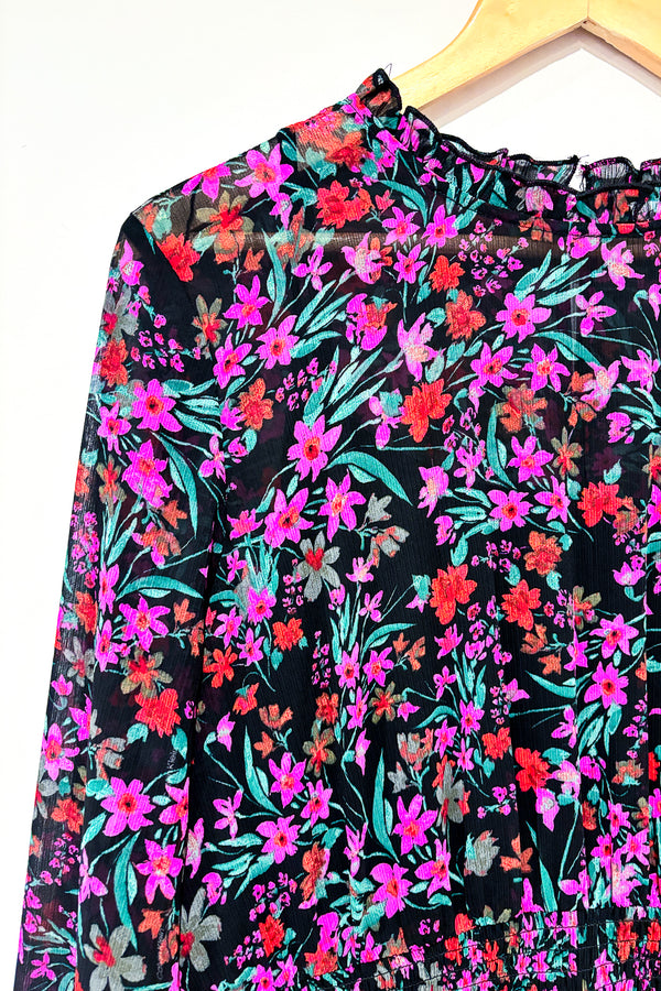 Robe midi noire et rose fleurie (l) seconde main Calvin Klein