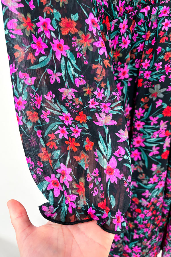 Robe midi noire et rose fleurie (l) seconde main Calvin Klein