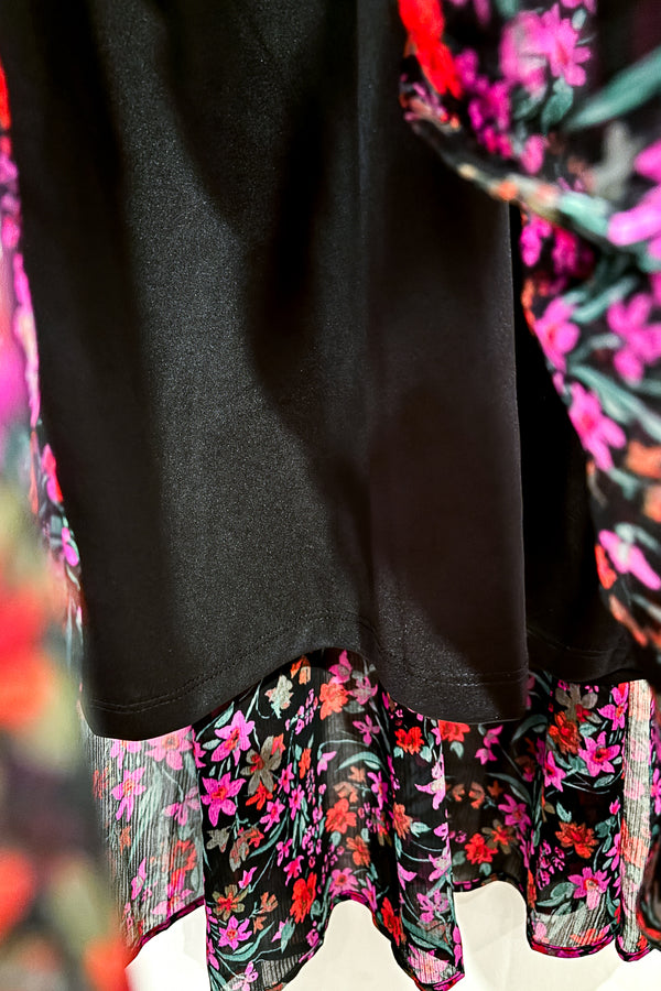 Robe midi noire et rose fleurie (l) seconde main Calvin Klein