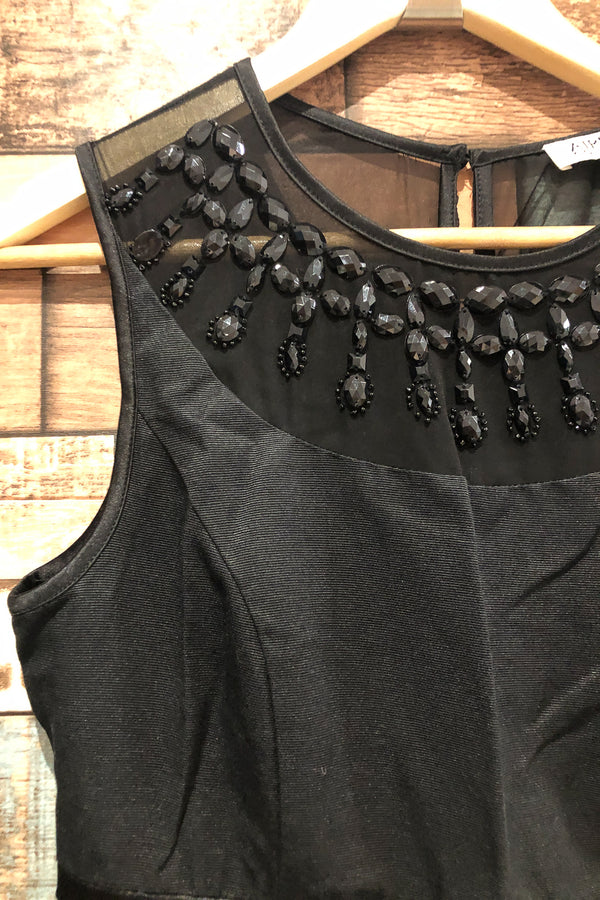 Robe noire avec pierres au col (s) seconde main Airoldi Collection