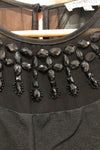 Robe noire avec pierres au col (s) seconde main Airoldi Collection