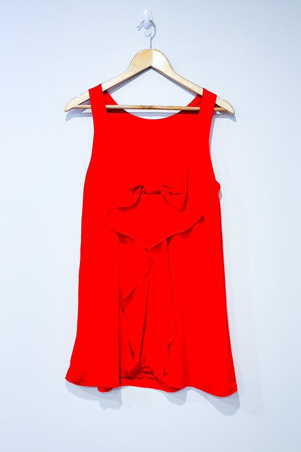 Robe orange avec boucle au dos (s) -- La Penderie du Paradis ?