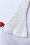 Robe courte blanche à paillettes et manches évasées seconde main - Michael Costello- La Penderie du Paradis
