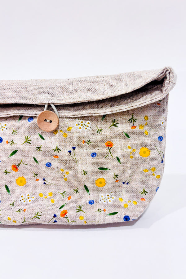 Trousse cosmétique beige avec fleurs seconde main - Yves Rocher- La Penderie du Paradis