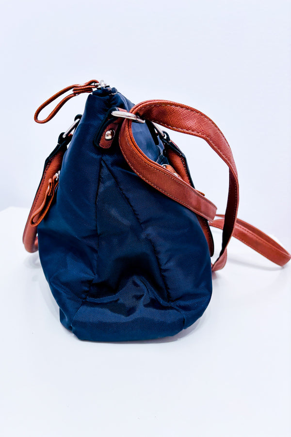 Sac à main marine et brun à bandoulière* seconde main - Roots- La Penderie du Paradis