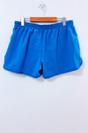 Short Dri-Fit bleu avec short intégré seconde main - Nike- La Penderie du Paradis