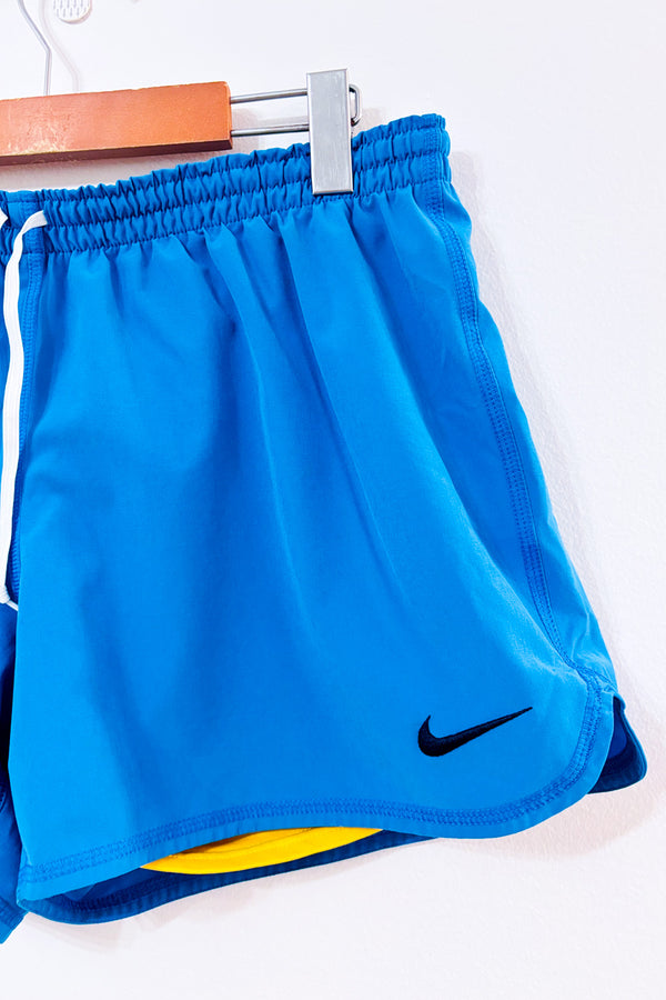 Short Dri-Fit bleu avec short intégré seconde main - Nike- La Penderie du Paradis