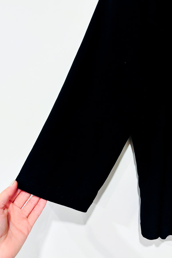 Veste courte noire et blanche motif pied de poule (m/l) -- La Penderie du Paradis ?