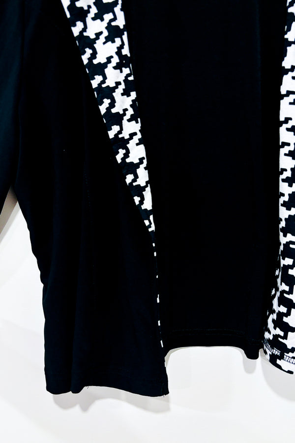 Veste courte noire et blanche motif pied de poule (m/l) -- La Penderie du Paradis ?
