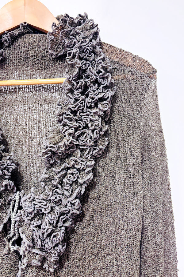 Cardigan vert en maille à nouer seconde main - Zen Den- La Penderie du Paradis