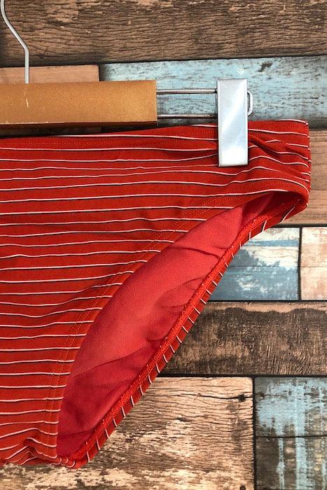 Bas de maillot de bain orange avec rayures (xl) seconde main Lolë