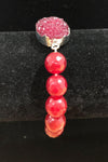 Bracelet de billes rouges seconde main Autres