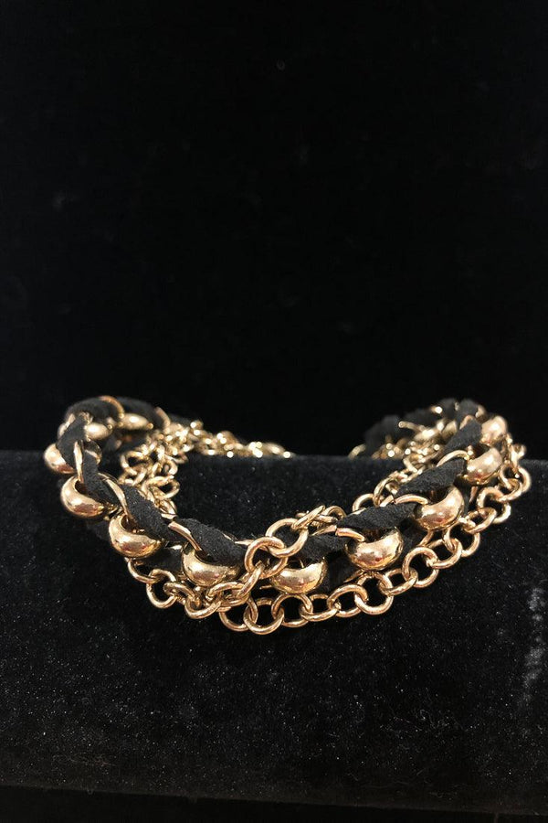 Bracelet triple noir et or seconde main Autres