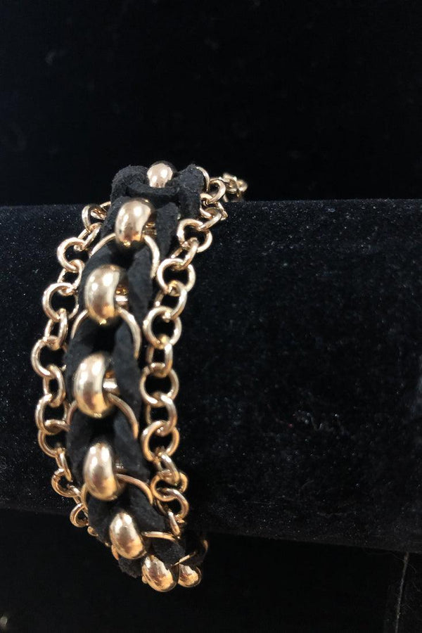 Bracelet triple noir et or seconde main Autres