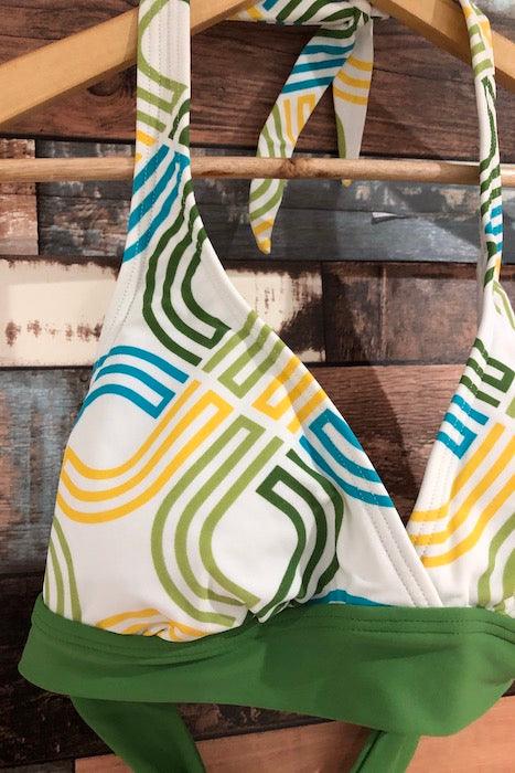 Haut de maillot de bain motif logo vert jaune et bleu (l) seconde main Lolë