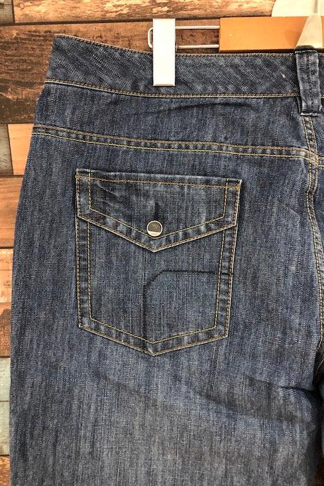 Jeans bleu jambe évasée détails verts (l) seconde main Orage