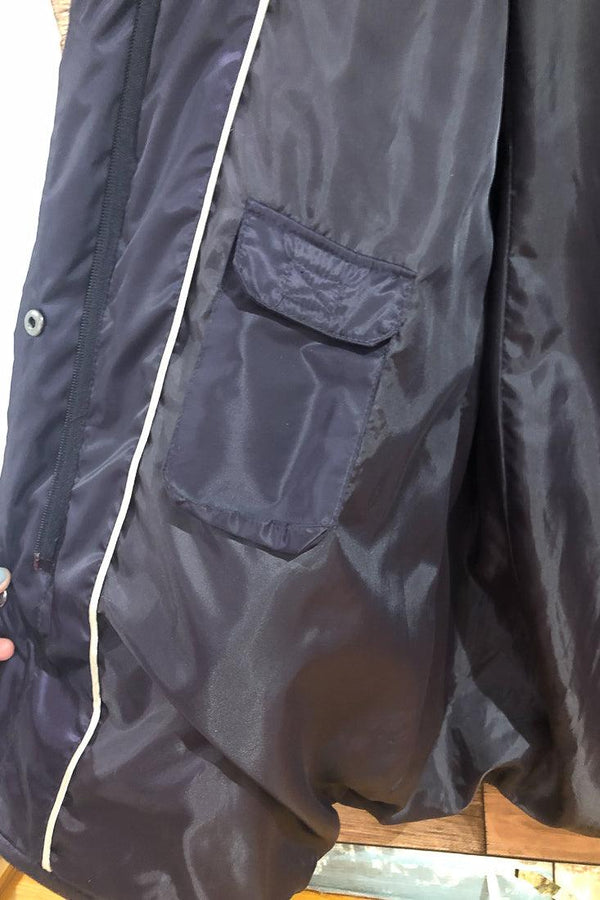 Manteau mauve gaufré doublé en duvet avec capuchon en fourrure (xl) seconde main Laura