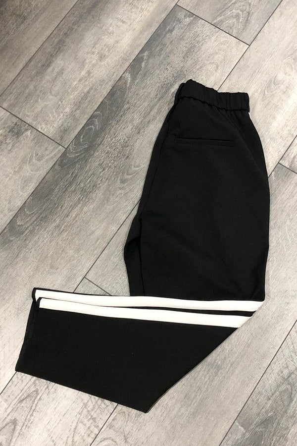 Pantalon 7/8 noir avec bande blanche sur le côté (xs) seconde main Zara