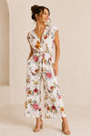 Jumpsuit blanc fleuri cache-coeur seconde main - SWS Streetwear Society- La Penderie du Paradis