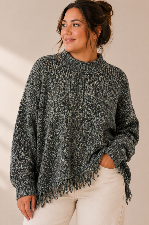 Haut ample vert en tricot avec franges seconde main - AE Sports and co.- La Penderie du Paradis