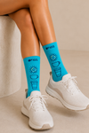 Chaussettes performance turquoise à motif café seconde main - Figs- La Penderie du Paradis