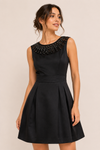 Robe cocktail noire à pierres seconde main - Airoldi Collection- La Penderie du Paradis
