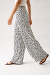 Pantalon fluide ample crème et noir motif animal * seconde main - La Penderie du Paradis- La Penderie du Paradis