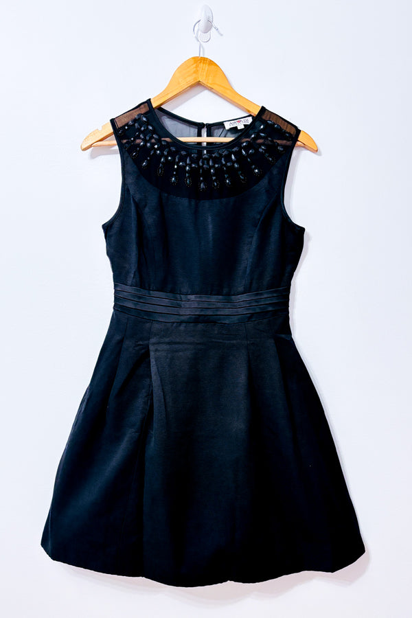 Robe cocktail noire à pierres seconde main - Airoldi Collection- La Penderie du Paradis