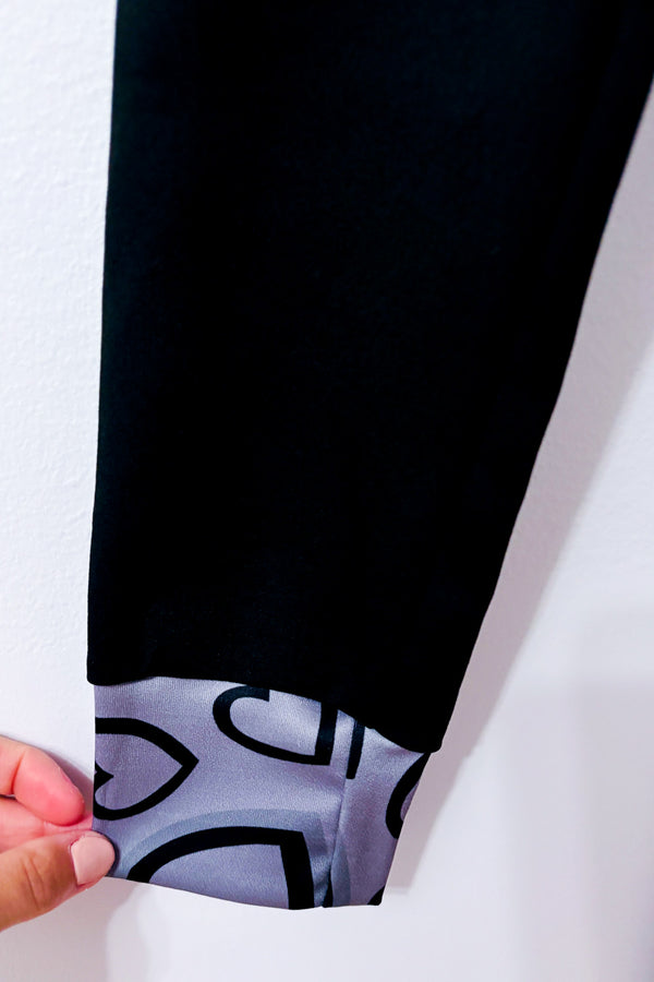 Robe noire à motifs cœurs et col montant seconde main - Misslook- La Penderie du Paradis