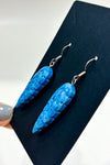 Boucles d'oreilles pendentif plume bleue seconde main Autres 