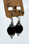 Black ball pendant earrings