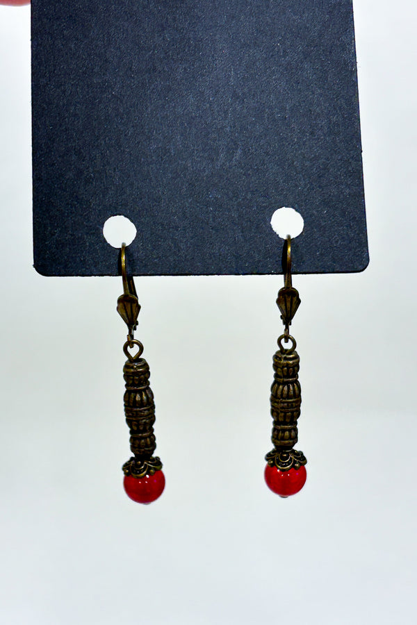 Boucles d’oreilles pendantes dorées à perles rouges seconde main - Autres- La Penderie du Paradis