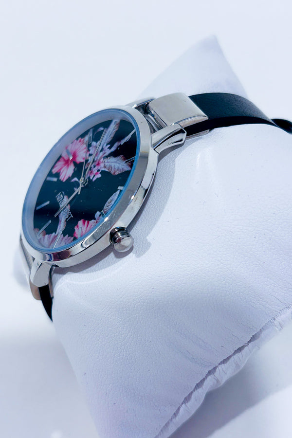 Montre noire avec cadran floral seconde main - Nine West- La Penderie du Paradis