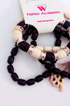 Bracelets extensibles en perles brunes et beiges avec pompon seconde main - Autres- La Penderie du Paradis