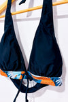 Haut de maillot de bain noir, orange et vert fleuri seconde main - SHEIN- La Penderie du Paradis
