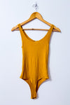 Bodysuit côtelé safran avec fermeture éclair seconde main - SWS Streetwear Society- La Penderie du Paradis